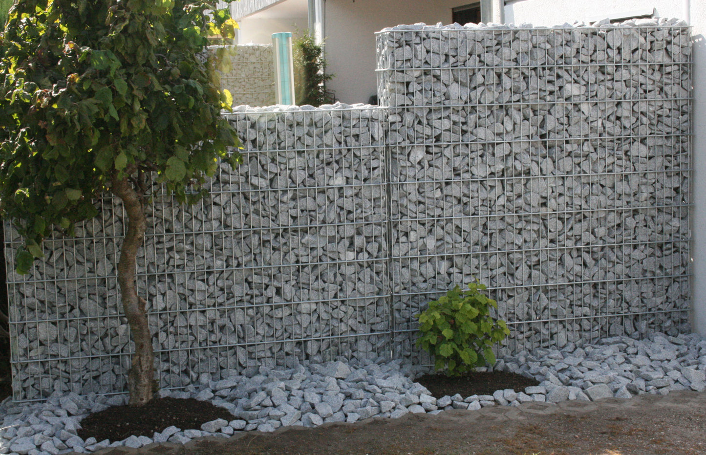 Gabionenzaun aus Metall mit Steinf�llung als Sichtschutz-Zaunanlage im Garten – MY-Zaunsysteme