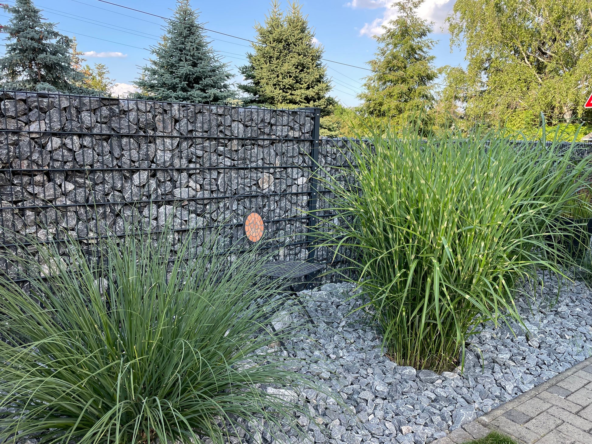 Gabionenzaun aus Metall mit Steinen als Sichtschutz-Zaunanlage im Garten – MY-Zaunsysteme
